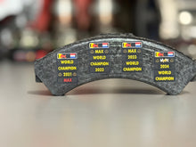 Load image into Gallery viewer, Grand Prix used Formula One Brake pad Red Bull Racing - Max Verstappen - FIA Formula One Drivers' World Champion F1-247