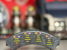 Load image into Gallery viewer, Grand Prix used Formula One Brake pad Red Bull Racing - Max Verstappen - FIA Formula One Drivers' World Champion F1-247
