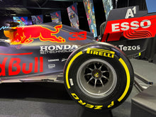 Load image into Gallery viewer, Formula One Race Used Wheel Nut Desk Clock featuring the Pirelli Tyre stand - Red Bull Racing - Max Verstappen - FIA Formula One Drivers&#39; World Champion F1-247 (Copy)
