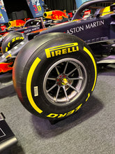 Load image into Gallery viewer, Formula One Race Used Wheel Nut Desk Clock featuring the Pirelli Tyre stand - Red Bull Racing - Max Verstappen - FIA Formula One Drivers&#39; World Champion F1-247 (Copy)
