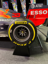 Load image into Gallery viewer, Formula One Race Used Wheel Nut Desk Clock featuring the Pirelli Tyre stand - Red Bull Racing - Max Verstappen - FIA Formula One Drivers&#39; World Champion F1-247 (Copy)
