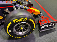 Load image into Gallery viewer, Formula One Race Used Wheel Nut Desk Clock featuring the Pirelli Tyre stand - Red Bull Racing - Max Verstappen - FIA Formula One Drivers&#39; World Champion F1-247 (Copy)
