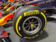 Load image into Gallery viewer, Formula One Race Used Wheel Nut Desk Clock featuring the Pirelli Tyre stand - Red Bull Racing - Max Verstappen - FIA Formula One Drivers&#39; World Champion F1-247 (Copy)
